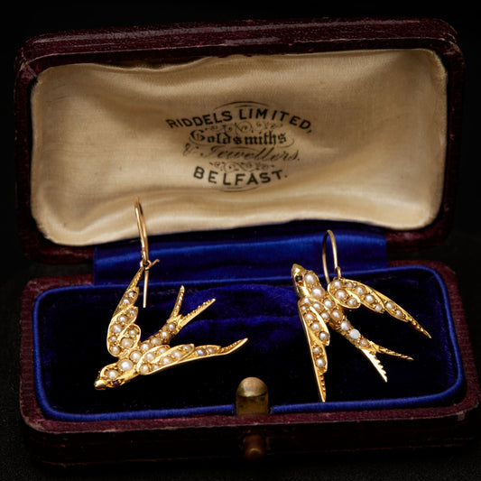 Swallows with Pearls and Ruby Eyes